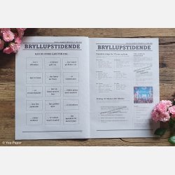 Detalje af bryllupsavis med billeder, citater og sjove indslag